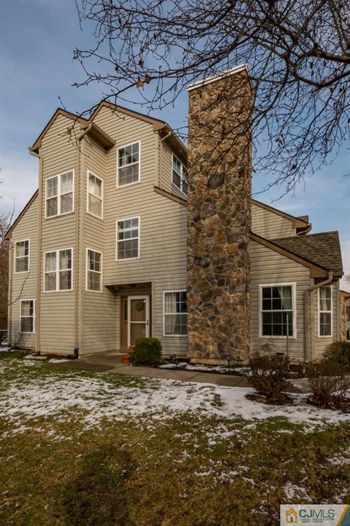 191 Nebula Road, Unit 191 Piscataway, NJ 08854 - Photo 24 of 24 a front view of a house with a yard