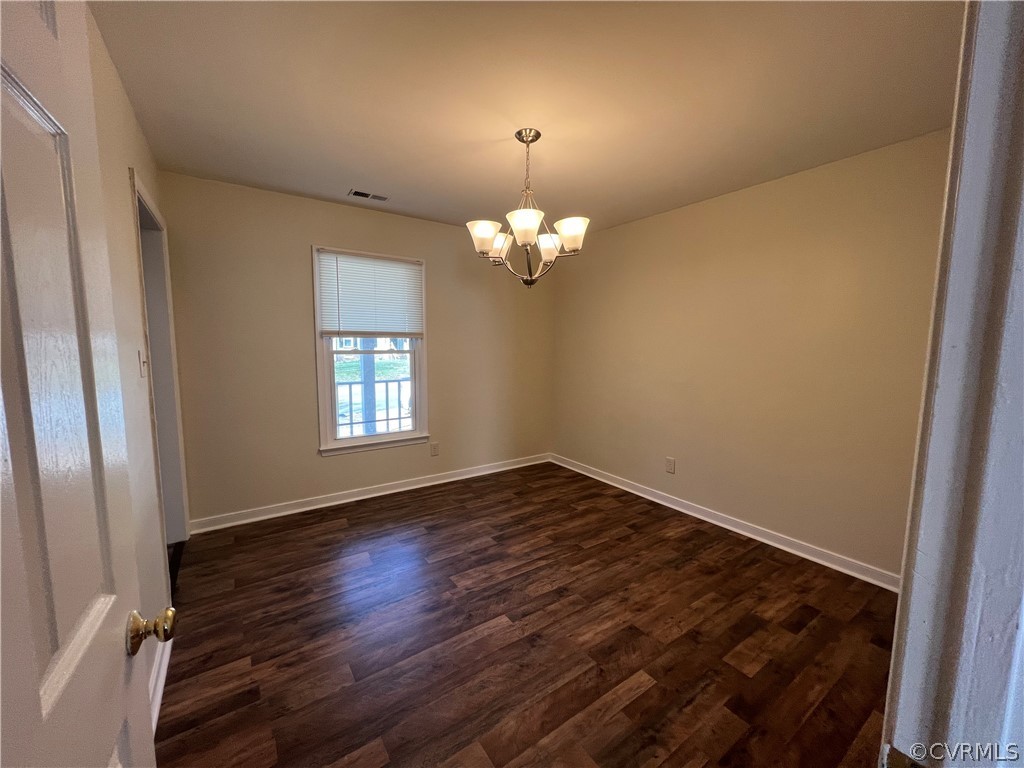 2525 Retrievers Ridge Road Richmond, VA 23233 - Photo 11 of 49 a view of an empty room with wooden floor and a window