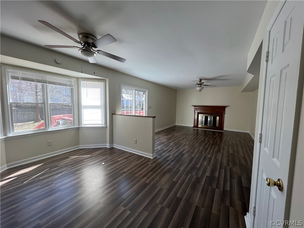 2525 Retrievers Ridge Road Richmond, VA 23233 - Photo 13 of 49 wooden floor in an empty room with a window