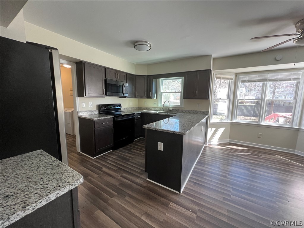 2525 Retrievers Ridge Road Richmond, VA 23233 - Photo 16 of 49 a large kitchen with stainless steel appliances granite countertop a stove a sink dishwasher and a refrigerator