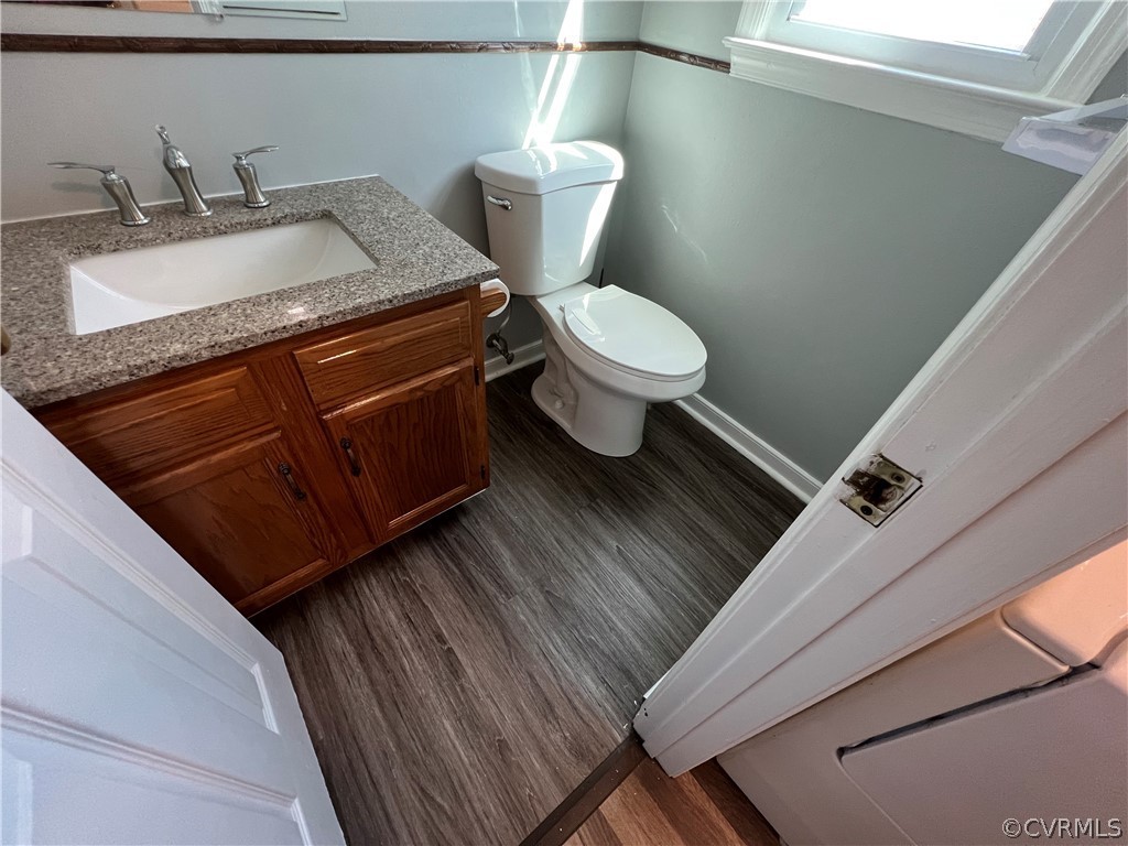 2525 Retrievers Ridge Road Richmond, VA 23233 - Photo 21 of 49 a bathroom with a granite countertop toilet and a sink