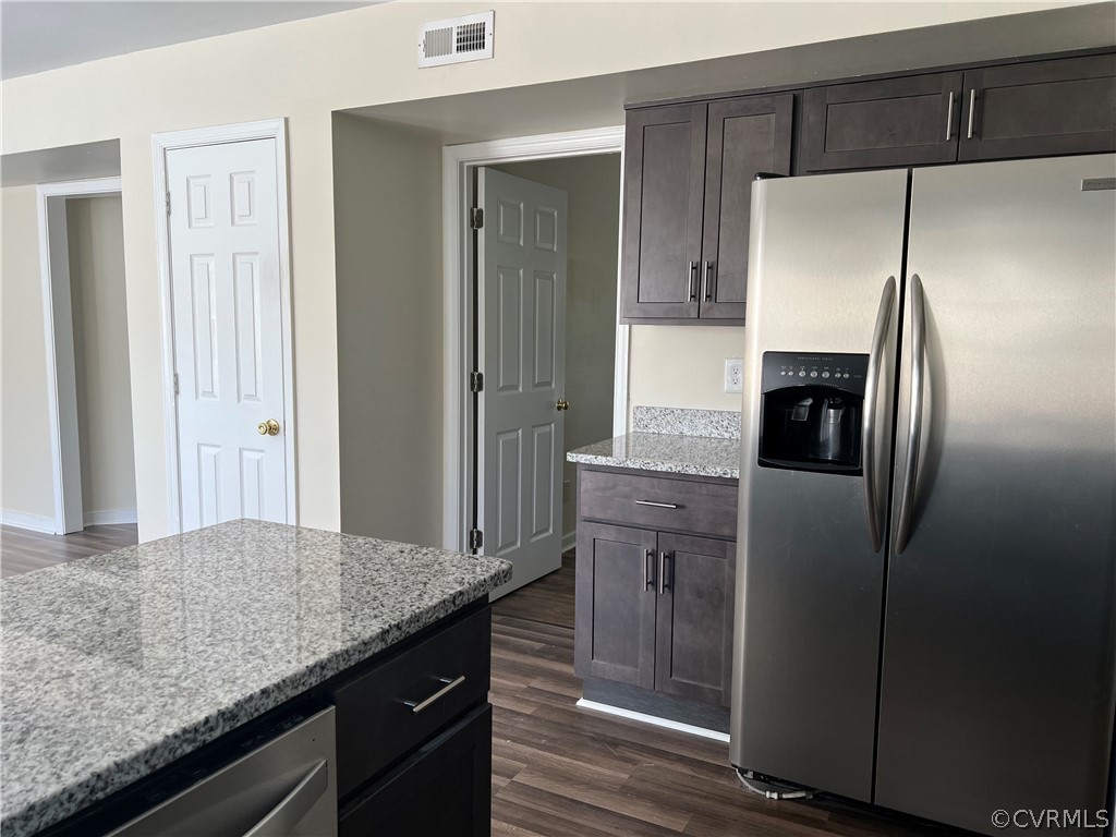 2525 Retrievers Ridge Road Richmond, VA 23233 - Photo 27 of 49 a kitchen with granite countertop stainless steel appliances a refrigerator and cabinets