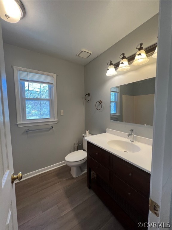 2525 Retrievers Ridge Road Richmond, VA 23233 - Photo 29 of 49 a bathroom with a toilet sink and mirror