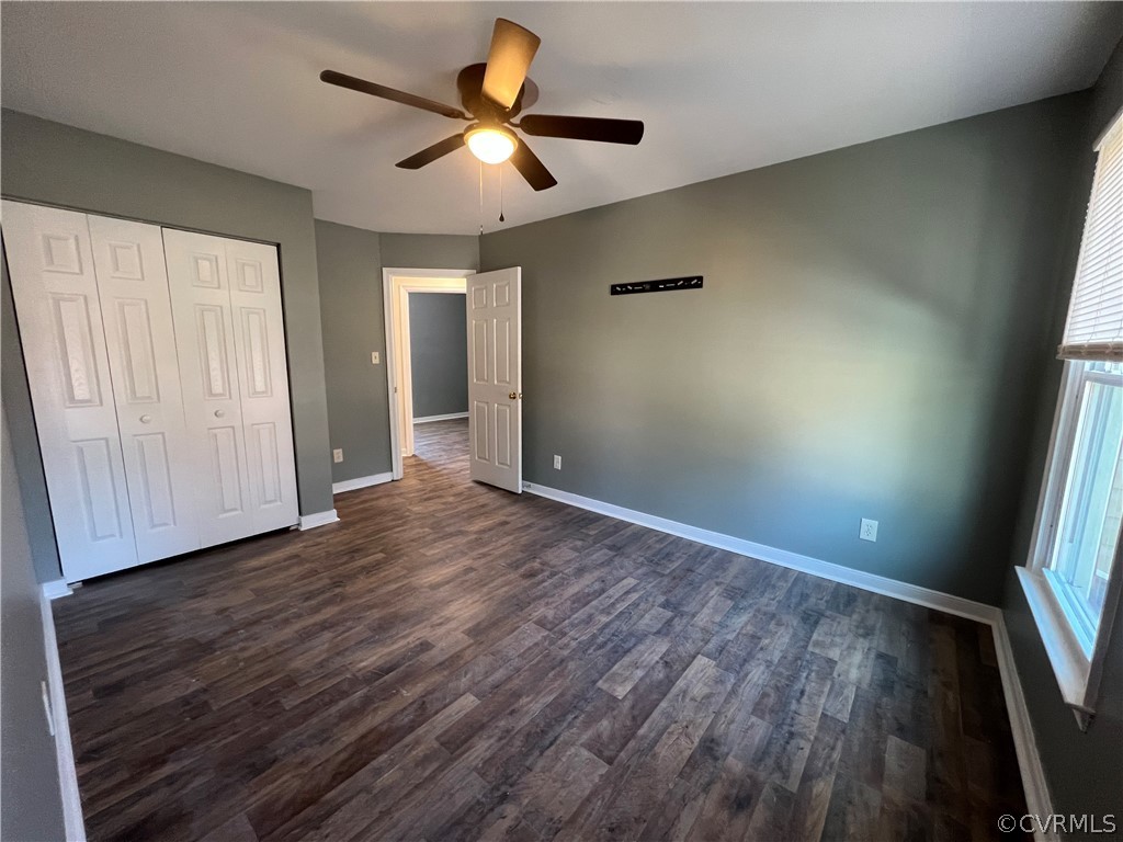2525 Retrievers Ridge Road Richmond, VA 23233 - Photo 36 of 49 an empty room with wooden floor and windows