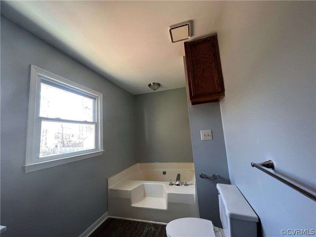 2525 Retrievers Ridge Road Richmond, VA 23233 - Photo 37 of 49 a bathroom with a toilet sink and mirror