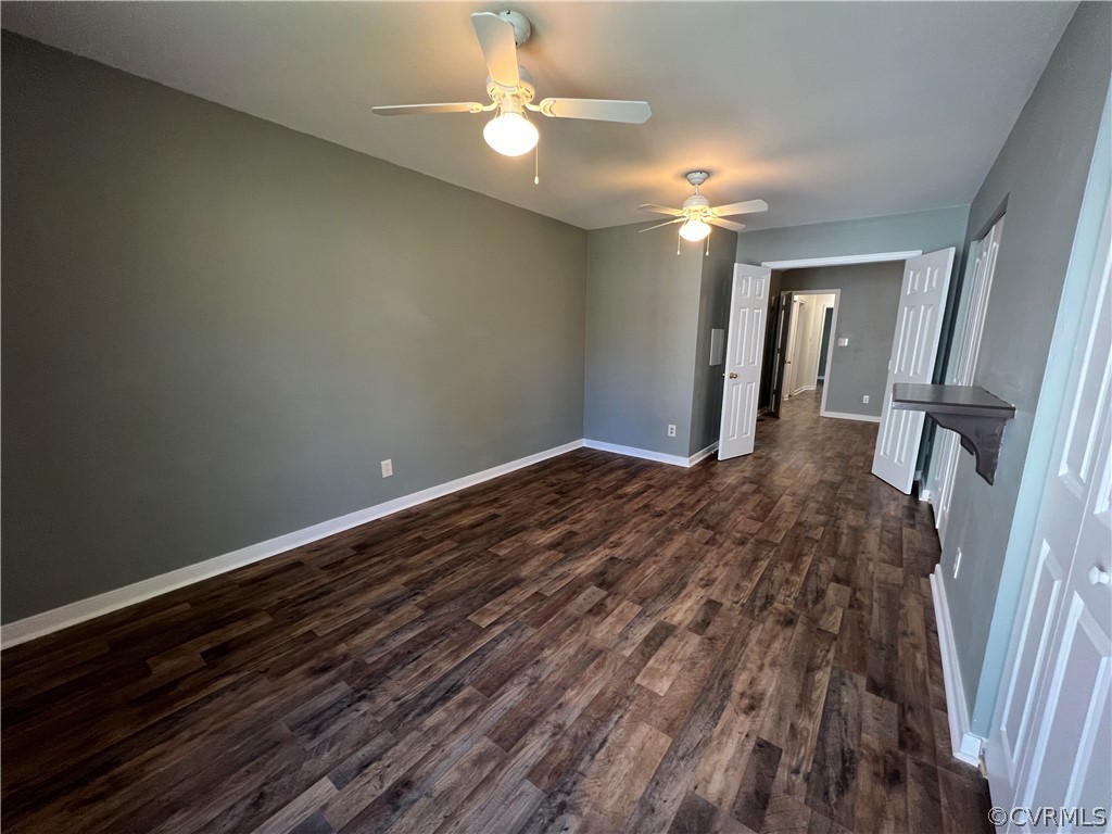2525 Retrievers Ridge Road Richmond, VA 23233 - Photo 44 of 49 wooden floor in an empty room with a mirror