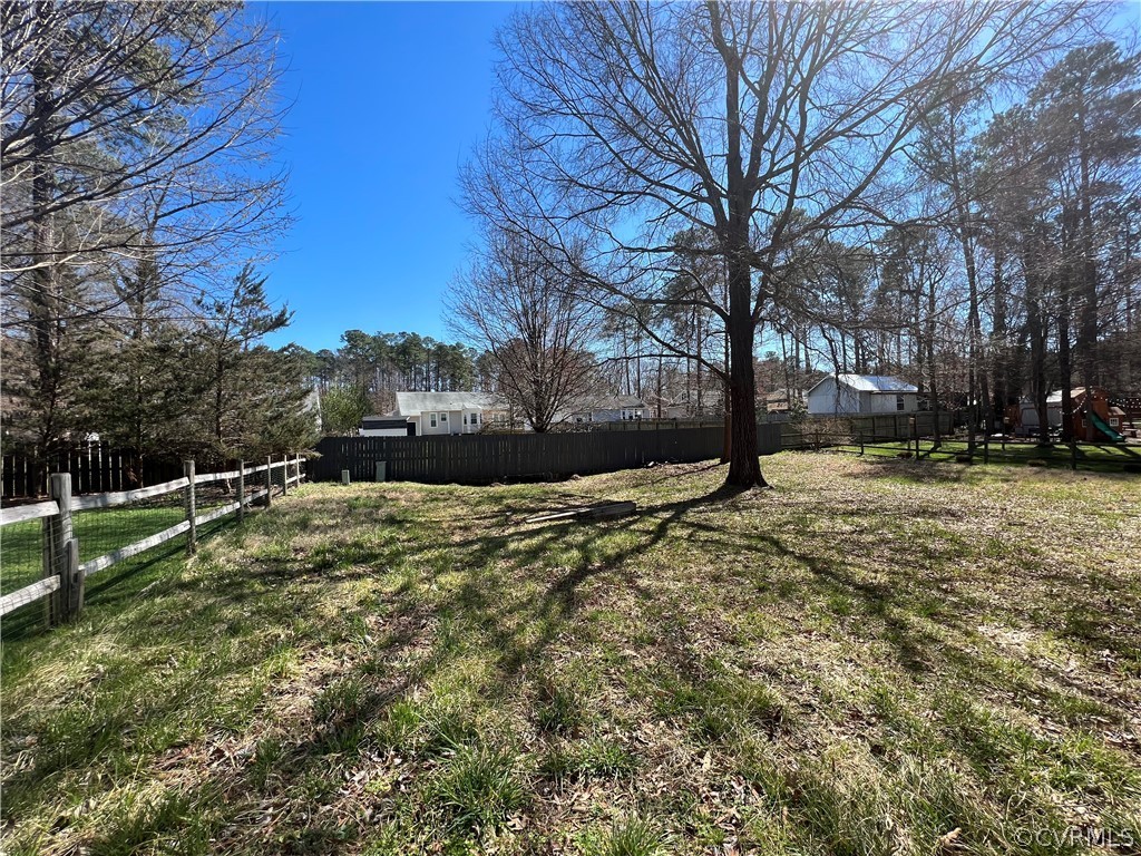 2525 Retrievers Ridge Road Richmond, VA 23233 - Photo 48 of 49 a view of yard with trees