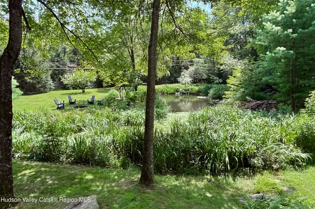 a view of a lake with a garden