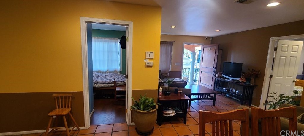 2478 Colorado Boulevard Eagle Rock, CA 90041 - Photo 10 of 14 a living room with furniture and a flat screen tv