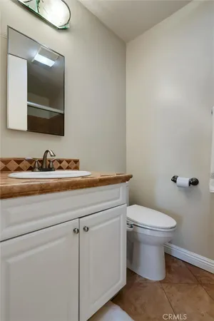 a view of a swimming pool with a yard