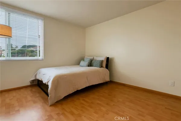 a view of swimming pool with outdoor seating and plants