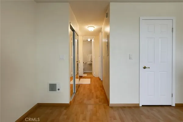 a view of a livingroom with furniture and a window
