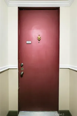 a view of a dining room with furniture wooden floor and chandelier