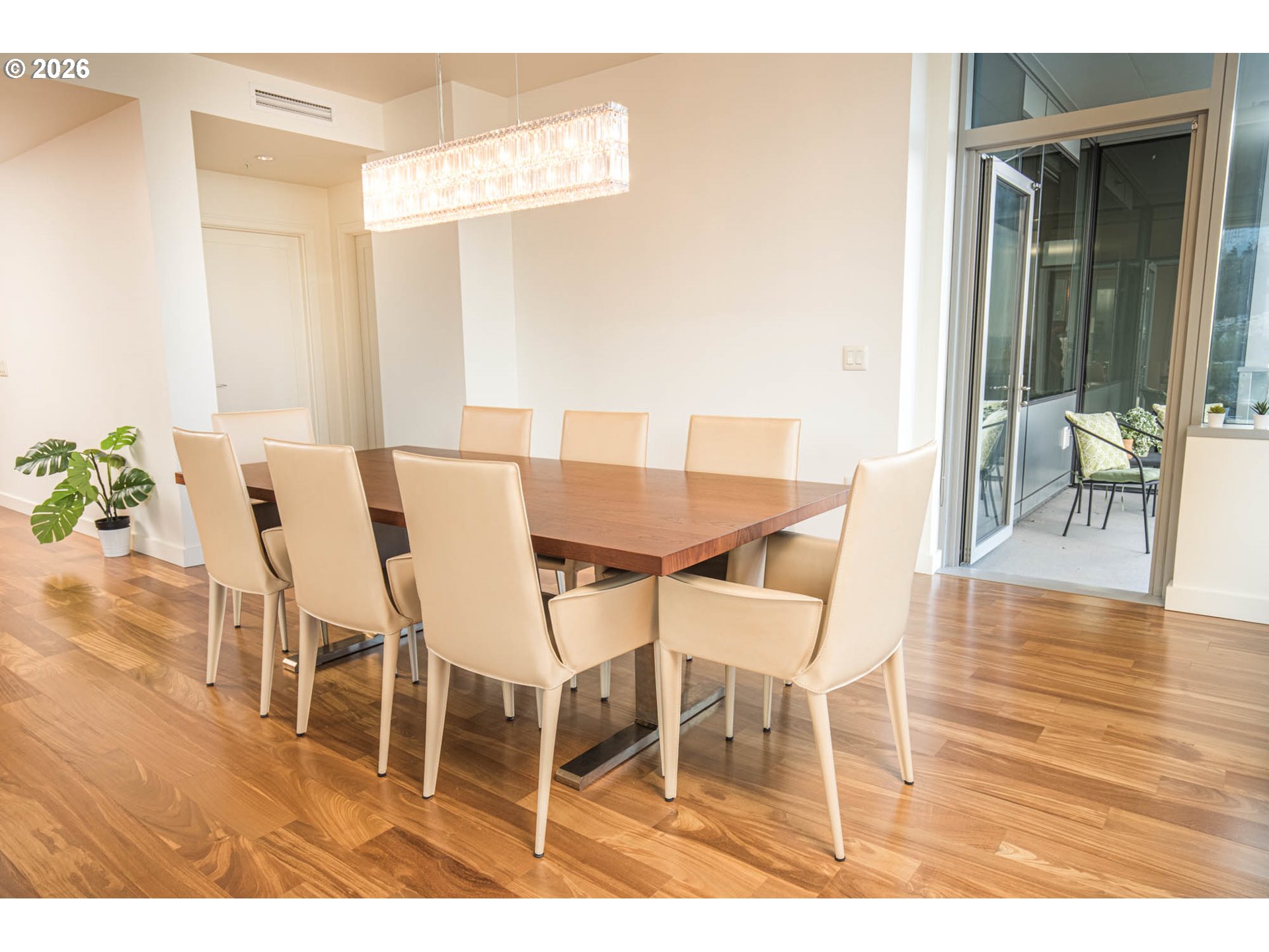 841 Southwest Gaines Street, Unit 2012 Portland, OR 97239 - Photo 14 of 44 a dining room with furniture and wooden floor