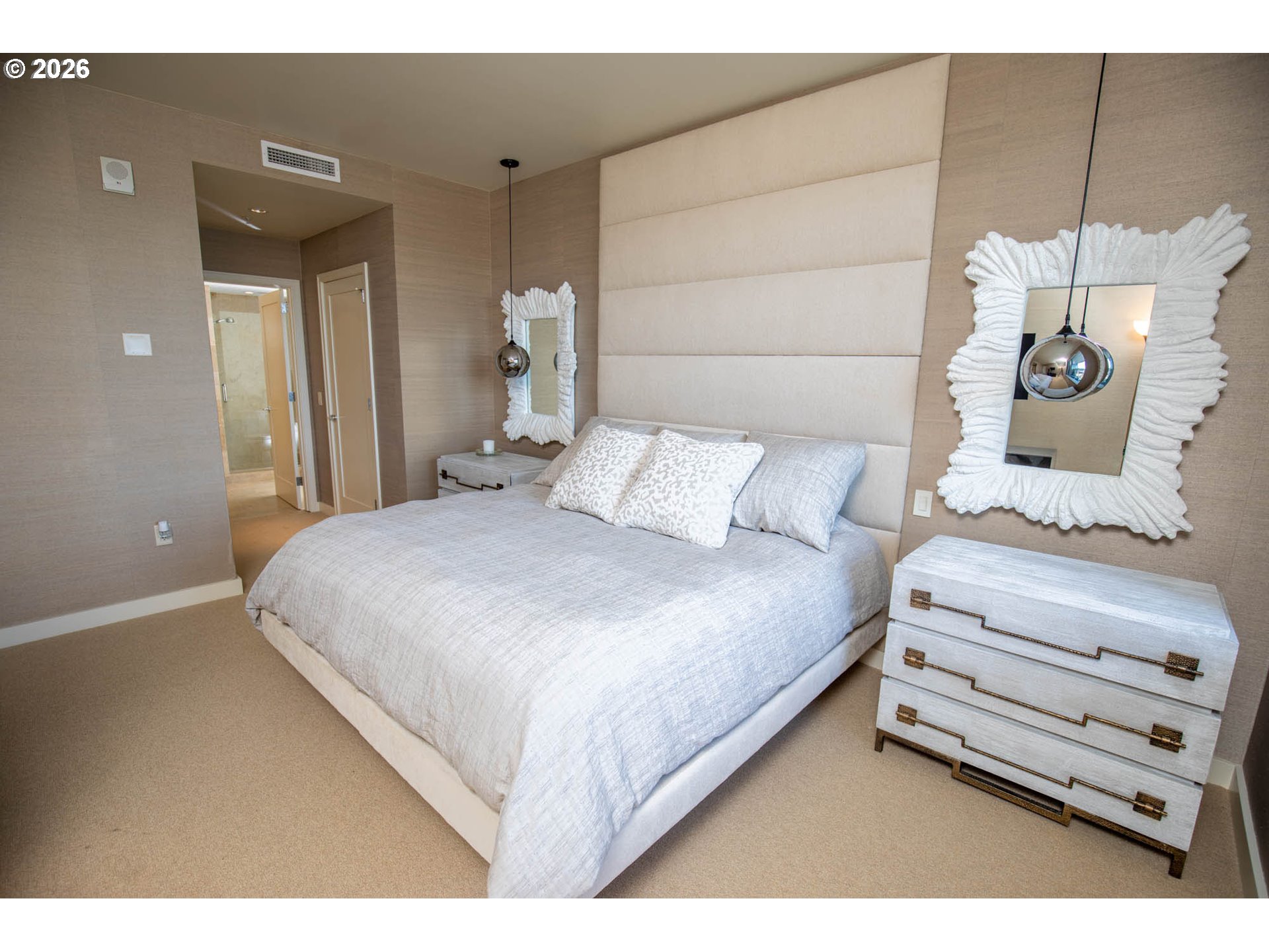 841 Southwest Gaines Street, Unit 2012 Portland, OR 97239 - Photo 23 of 44 a bedroom with a bed and a window