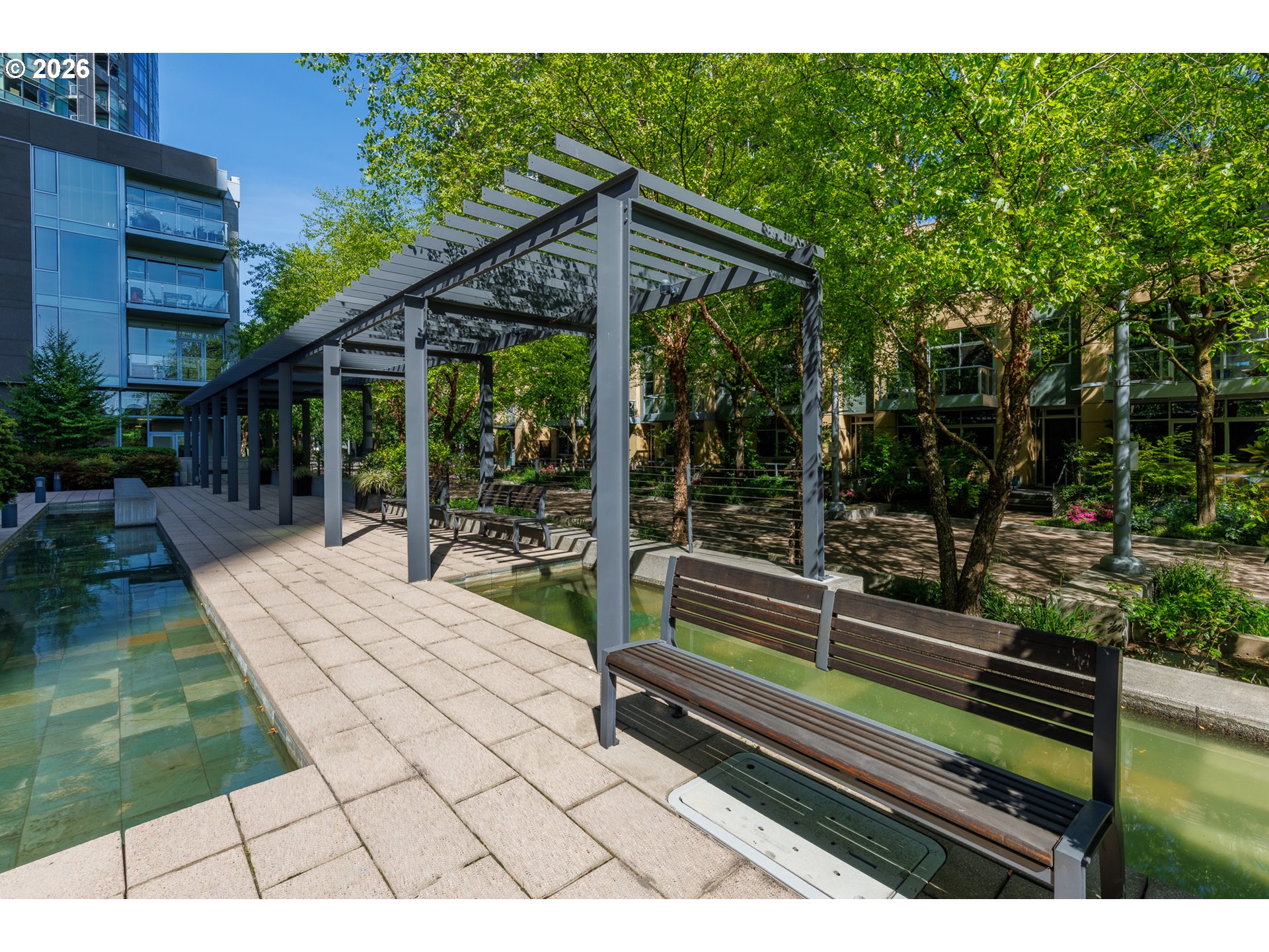 841 Southwest Gaines Street, Unit 2012 Portland, OR 97239 - Photo 35 of 44 a house view with a outdoor space