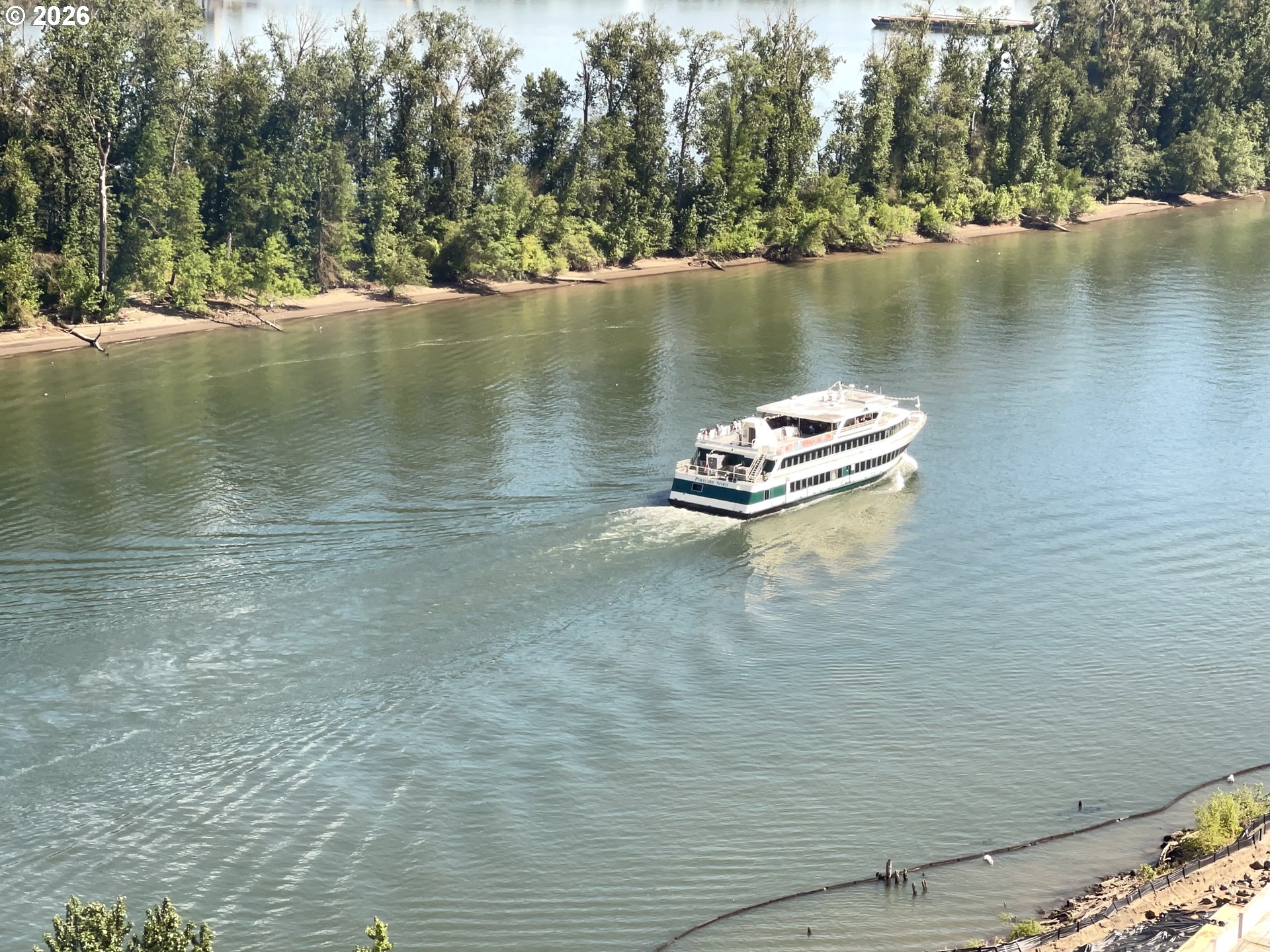 841 Southwest Gaines Street, Unit 2012 Portland, OR 97239 - Photo 39 of 44 a view of a lake with trees
