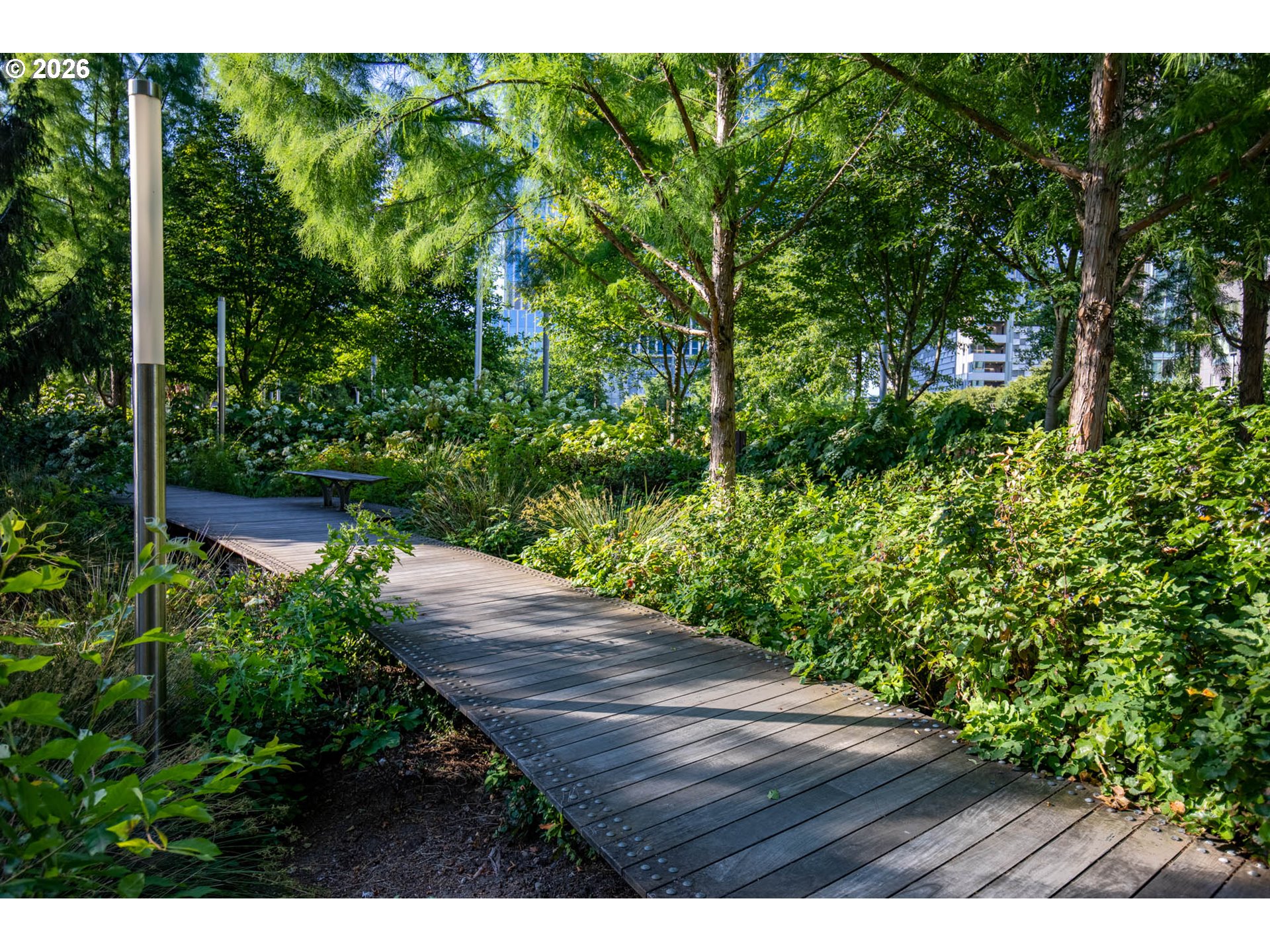 841 Southwest Gaines Street, Unit 2012 Portland, OR 97239 - Photo 40 of 44 a view of a garden with plants