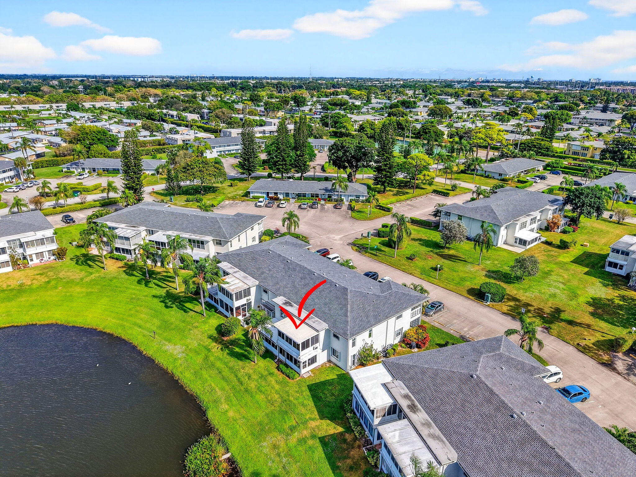 1411 Southwest 27th Avenue, Unit 201 Delray Beach, FL 33445 - Photo 2 of 48 50-web-or-mls-DJI_20251208113958_0372_D