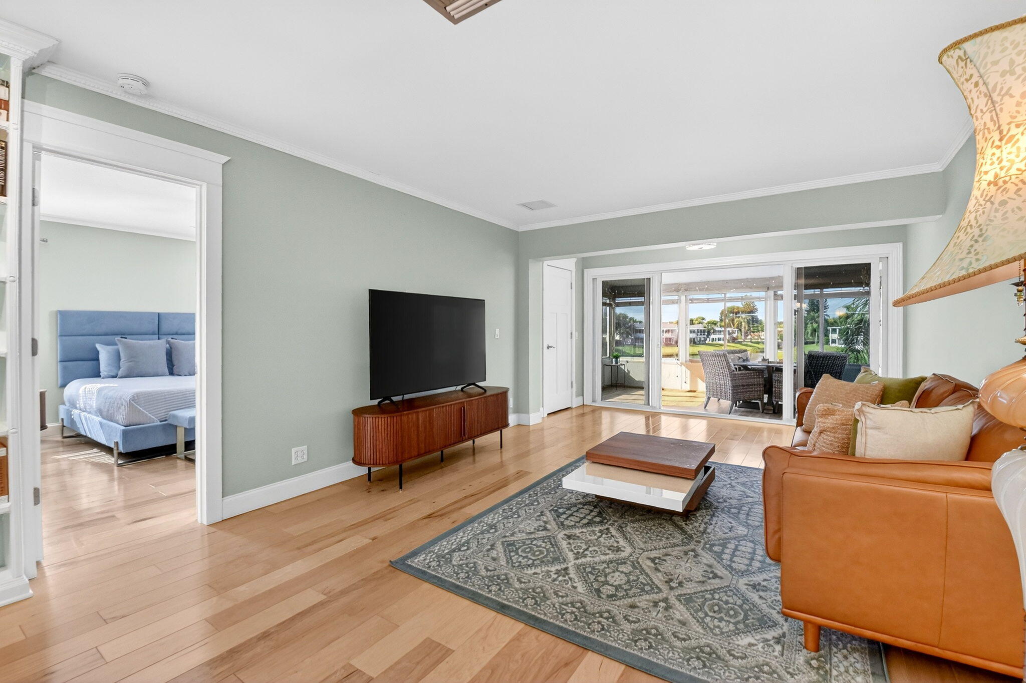 1411 Southwest 27th Avenue, Unit 201 Delray Beach, FL 33445 - Photo 9 of 48 a living room with furniture and a couch