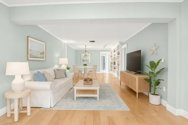 a spacious bathroom with a granite countertop sink mirror and a
