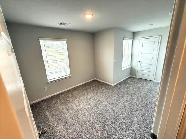 an empty room with closet