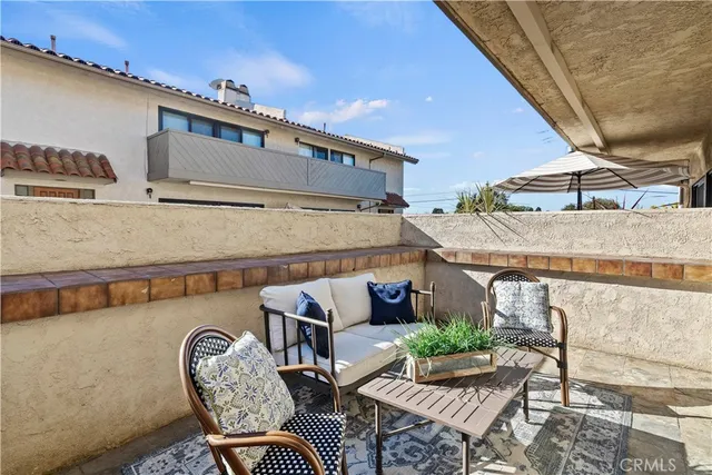 a view of a house with a door and wooden walls