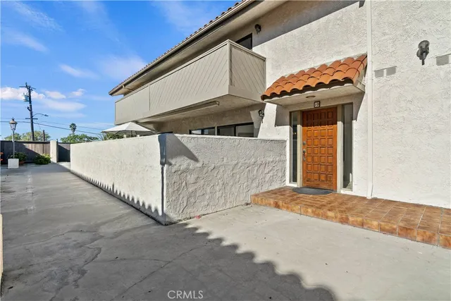 a view of a porch with seating space