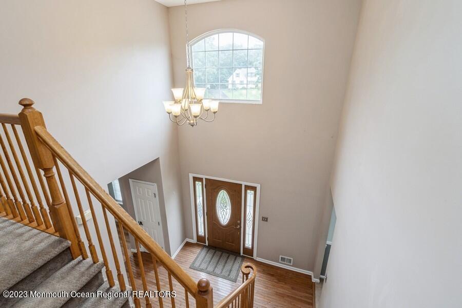 8 Dominion Drive Jackson, NJ 08527 - Photo 14 of 34 Vaulted ceiling foyer entrance