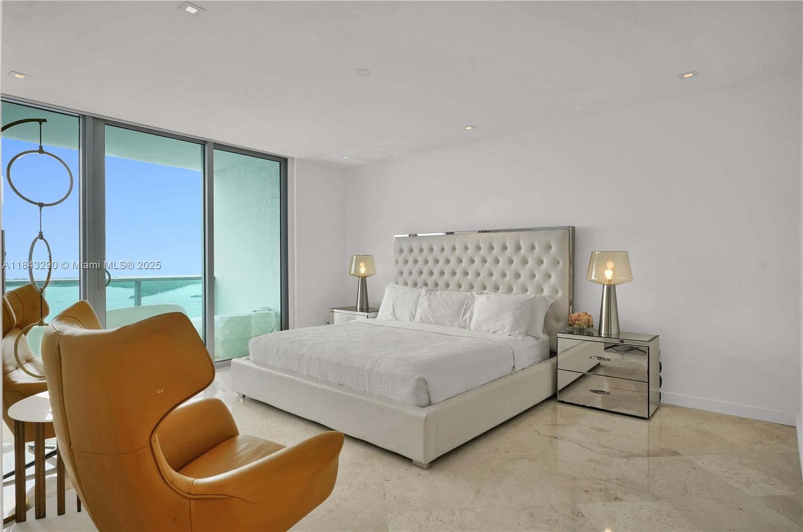 1331 Brickell Bay Drive, Unit 4303 Miami, FL 33131 - Photo 13 of 41 a bedroom with a bed and window