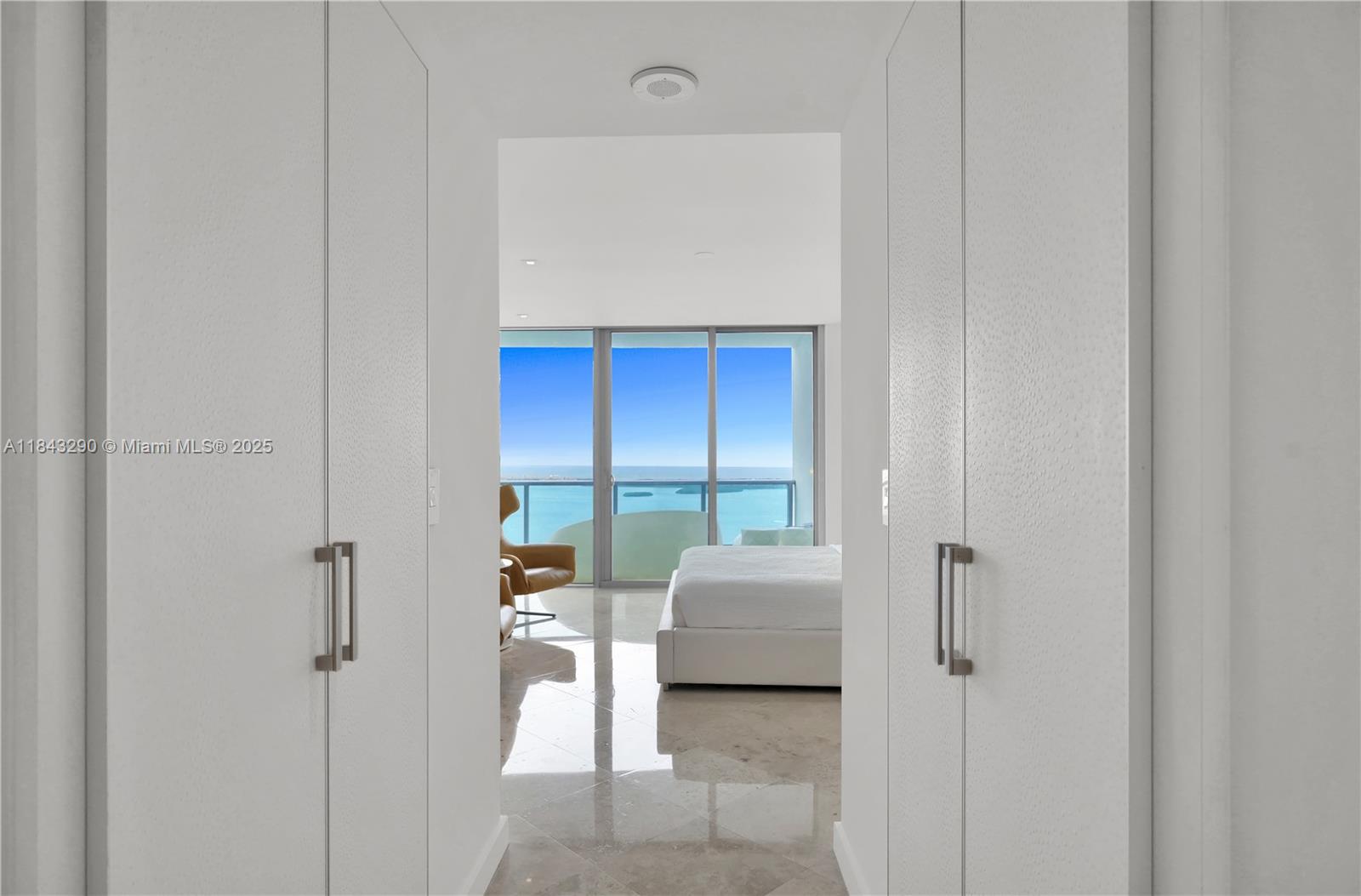 1331 Brickell Bay Drive, Unit 4303 Miami, FL 33131 - Photo 27 of 41 a living room with furniture and a window