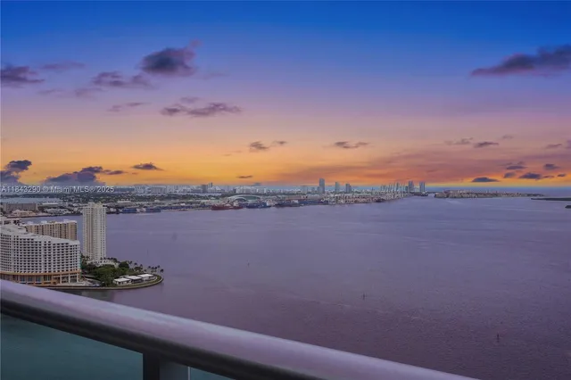 a view of a lake from a balcony
