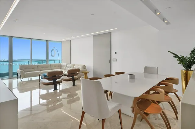 a view of a dining room with furniture