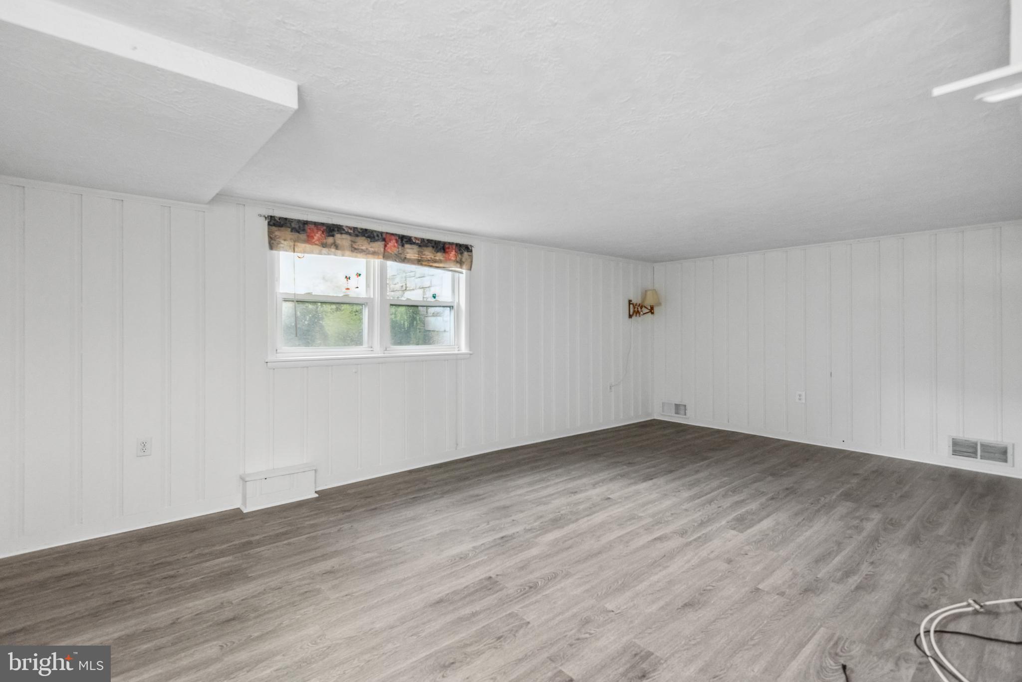 22 Croftley Road Lutherville-Timonium, MD 21093 - Photo 39 of 50 New flooring in lower level Rec room