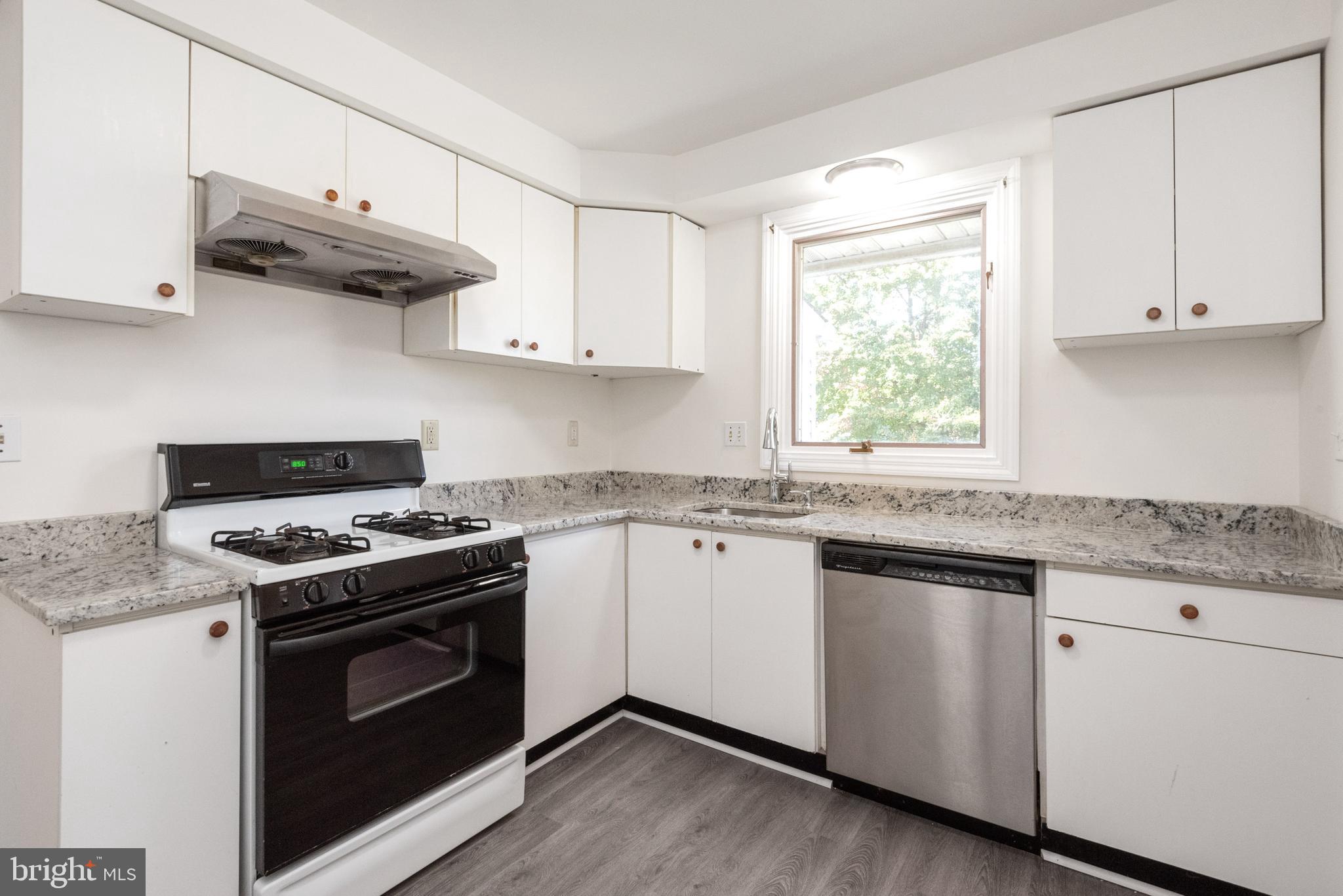 New counter and flooring in kitchen