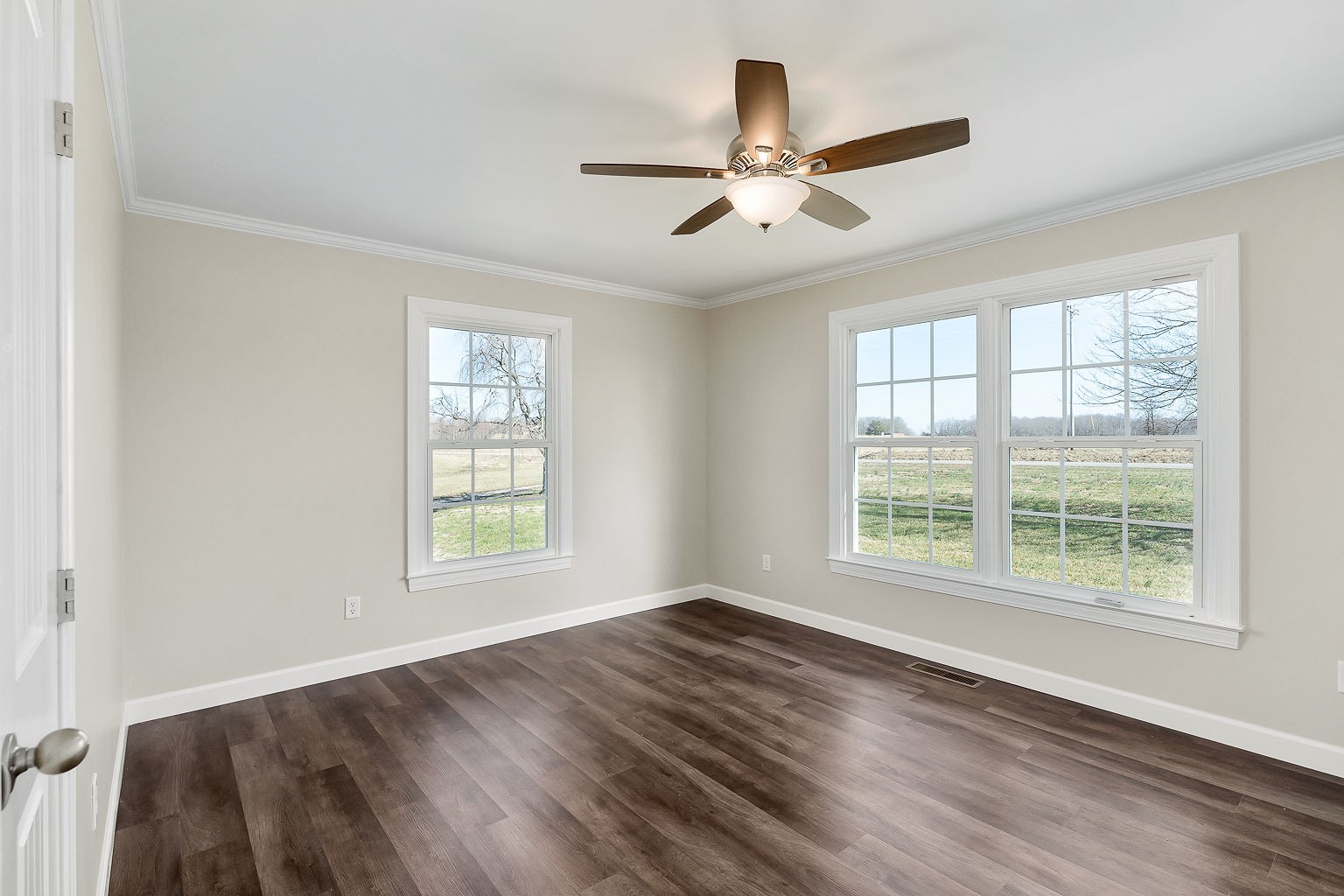 6401 Lucky Road McMinnville, TN 37110 - Photo 11 of 50 a view of an empty room with wooden floor and a window