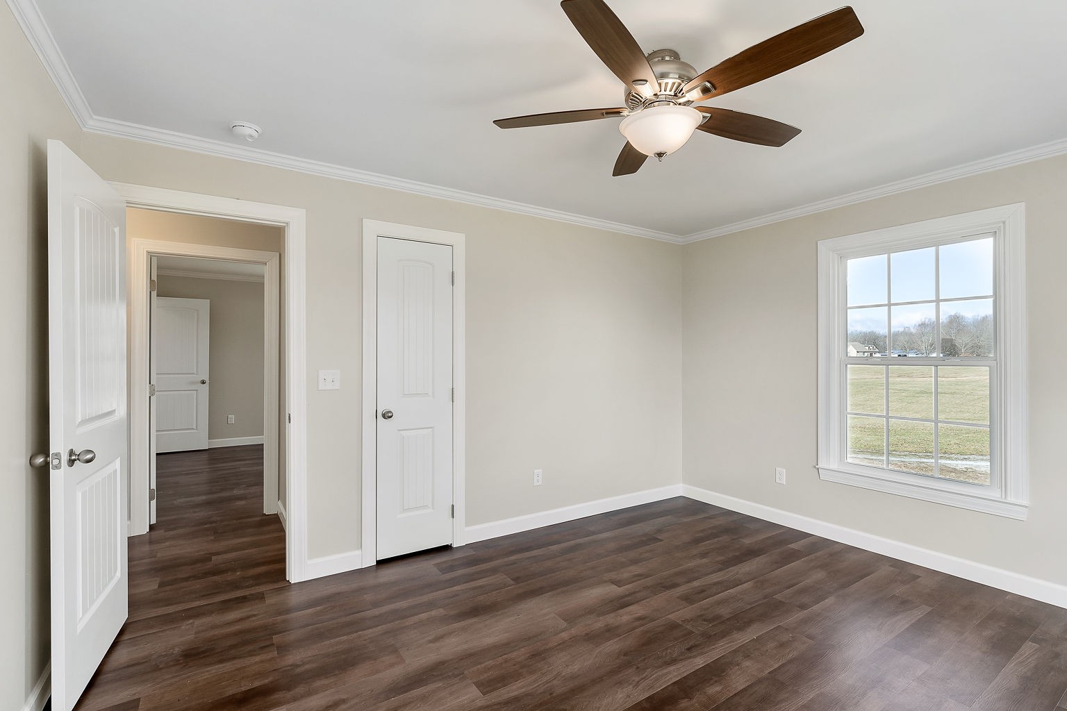 6401 Lucky Road McMinnville, TN 37110 - Photo 12 of 50 a view of an empty room with wooden floor and a window