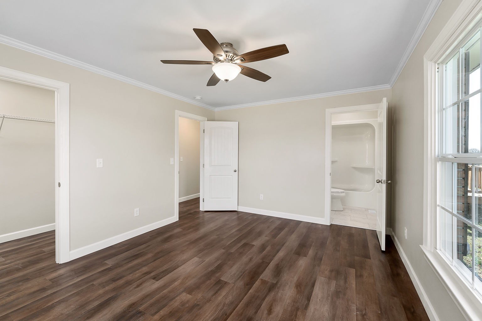 6401 Lucky Road McMinnville, TN 37110 - Photo 14 of 50 a view of an empty room with wooden floor and a window