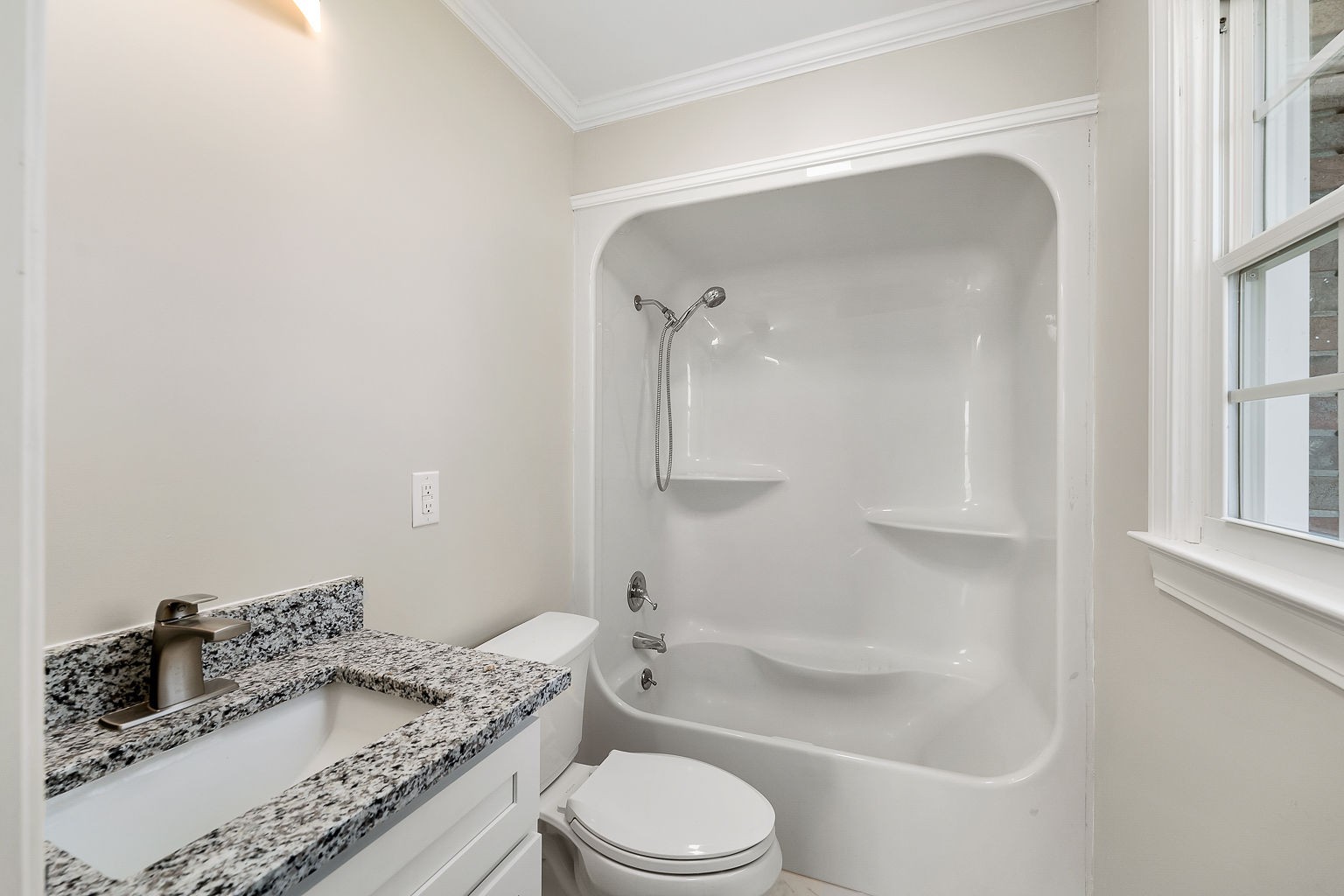 6401 Lucky Road McMinnville, TN 37110 - Photo 15 of 50 a bathroom with a granite countertop sink toilet and shower