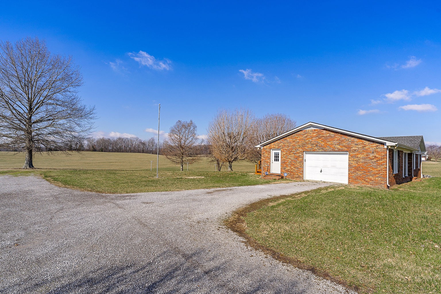 6401 Lucky Road McMinnville, TN 37110 - Photo 29 of 50 a view of a house with a big yard