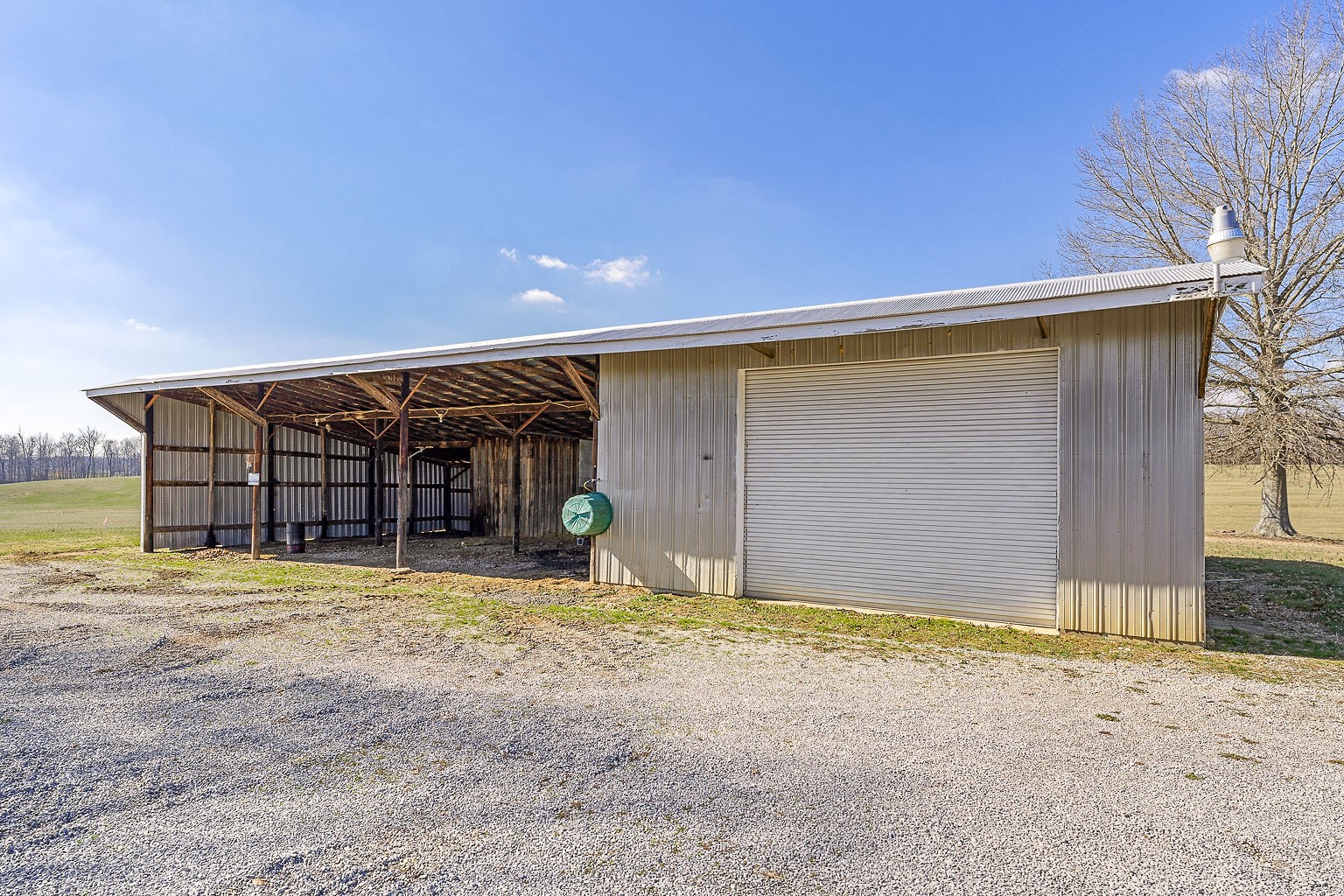 6401 Lucky Road McMinnville, TN 37110 - Photo 30 of 50 a view of a house with backyard and sitting area