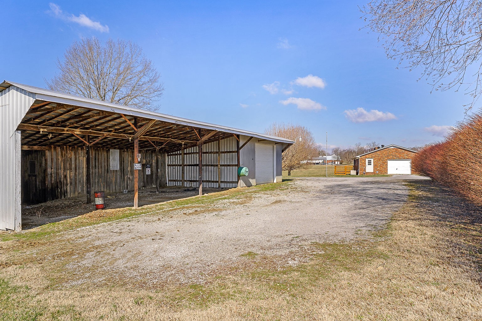 6401 Lucky Road McMinnville, TN 37110 - Photo 31 of 50 a view of a house with a yard