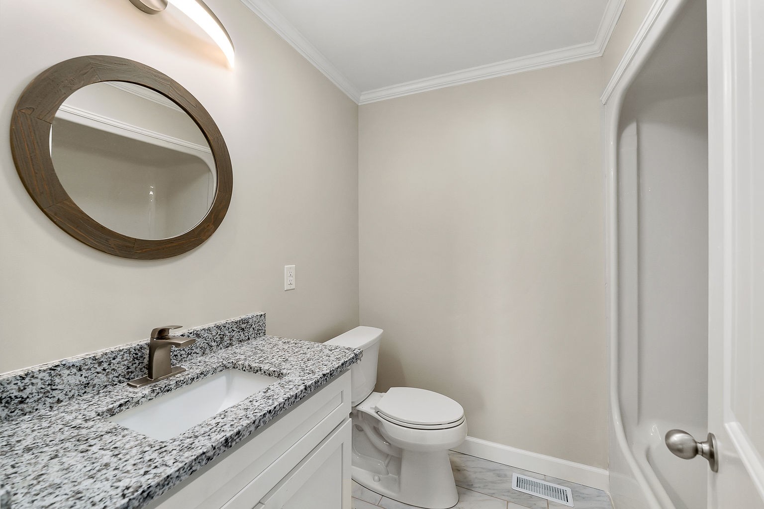 6401 Lucky Road McMinnville, TN 37110 - Photo 50 of 50 a bathroom with a granite countertop sink and a mirror
