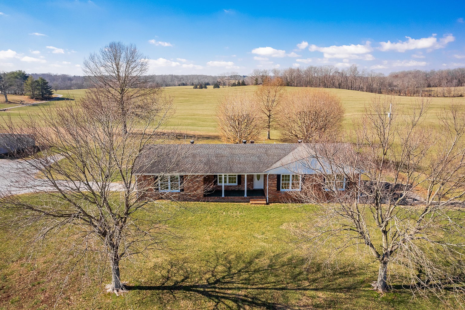 6401 Lucky Road McMinnville, TN 37110 - Photo 7 of 50 a view of a house with yard and lake view
