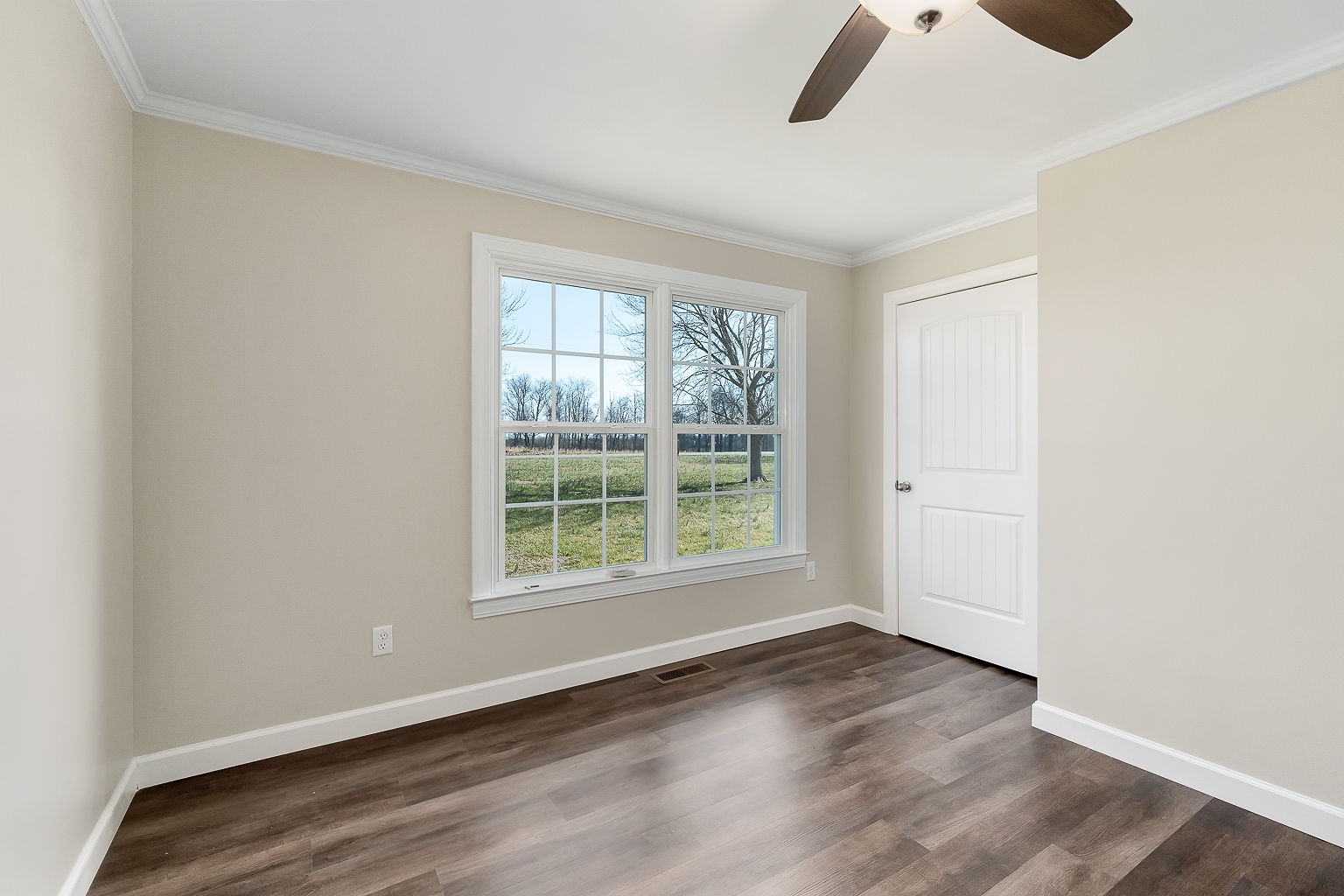 6401 Lucky Road McMinnville, TN 37110 - Photo 9 of 50 an empty room with wooden floor and windows