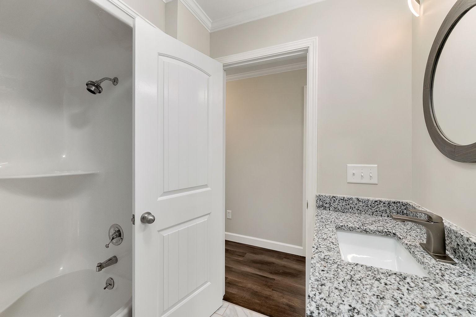 6401 Lucky Road McMinnville, TN 37110 - Photo 10 of 50 a bathroom with a granite countertop sink and a mirror