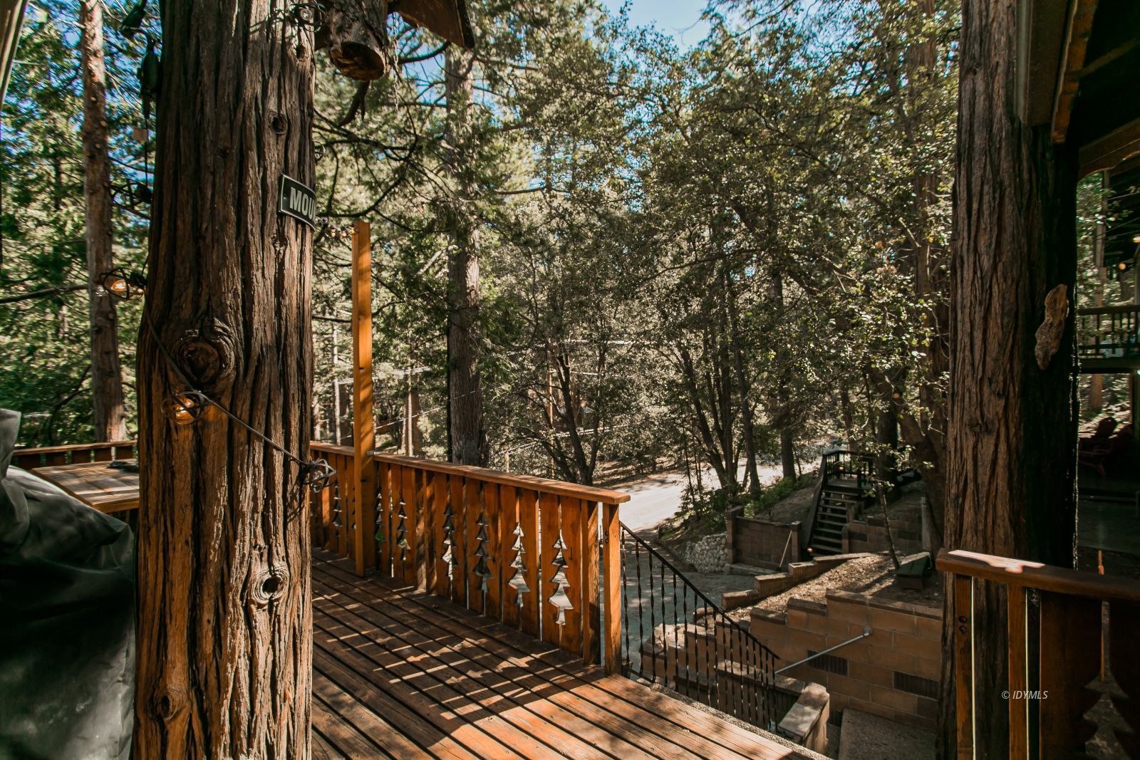 52507 Sylvan Way Idyllwild, CA 92549 - Photo 3 of 43 a view of balcony with wooden floor and fence