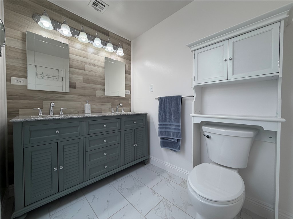 1985 Laguna Road Mohave Valley, AZ 86440 - Photo 29 of 83 Full bathroom featuring double vanity.