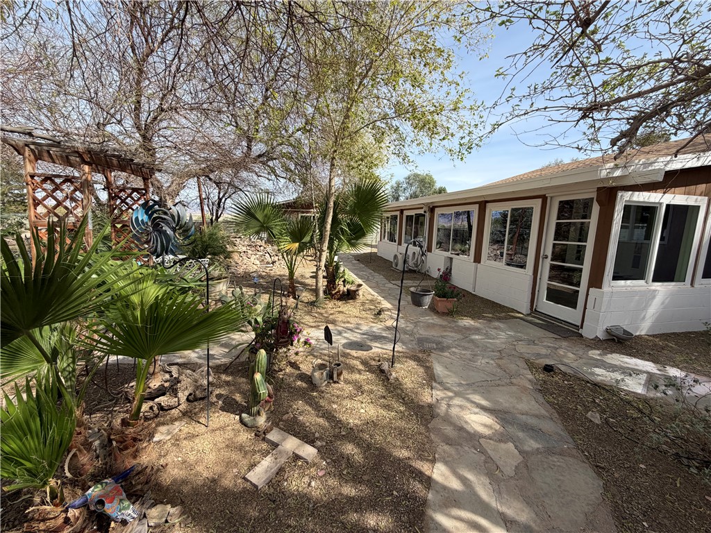 1985 Laguna Road Mohave Valley, AZ 86440 - Photo 57 of 83 View of yard featuring a sunroom