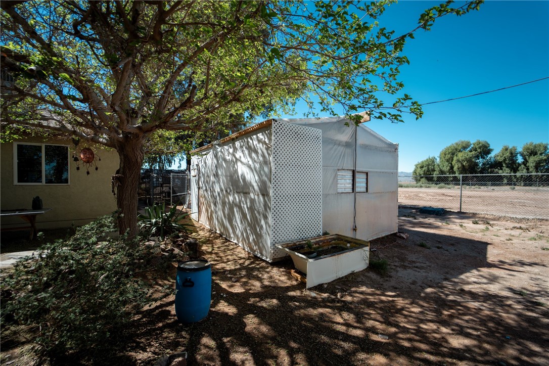 1985 Laguna Road Mohave Valley, AZ 86440 - Photo 62 of 83 The property features a spacious yard with a large tree providing ample shade